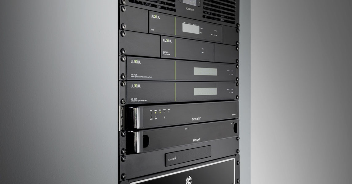 Luxul routers and switches installed in a rack for network