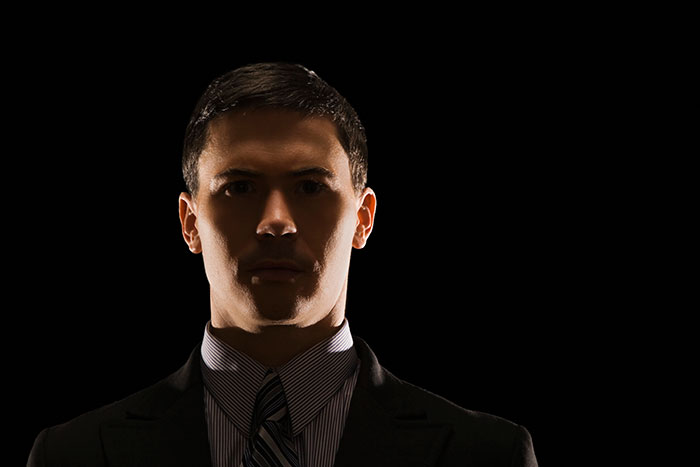 Guy with too much backlighting that makes his face hard to see.