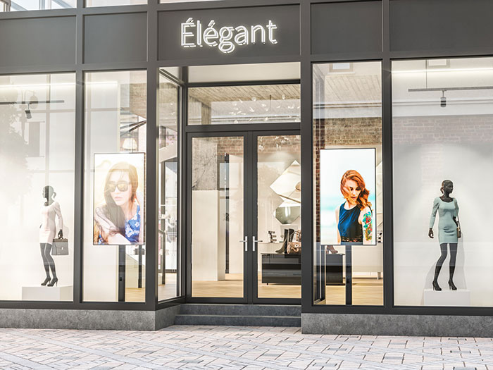 Retail store with digital signage to catch curbside attention.