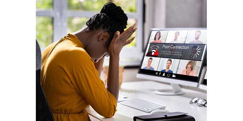 Person at computer unable to join conference due to connection issues.