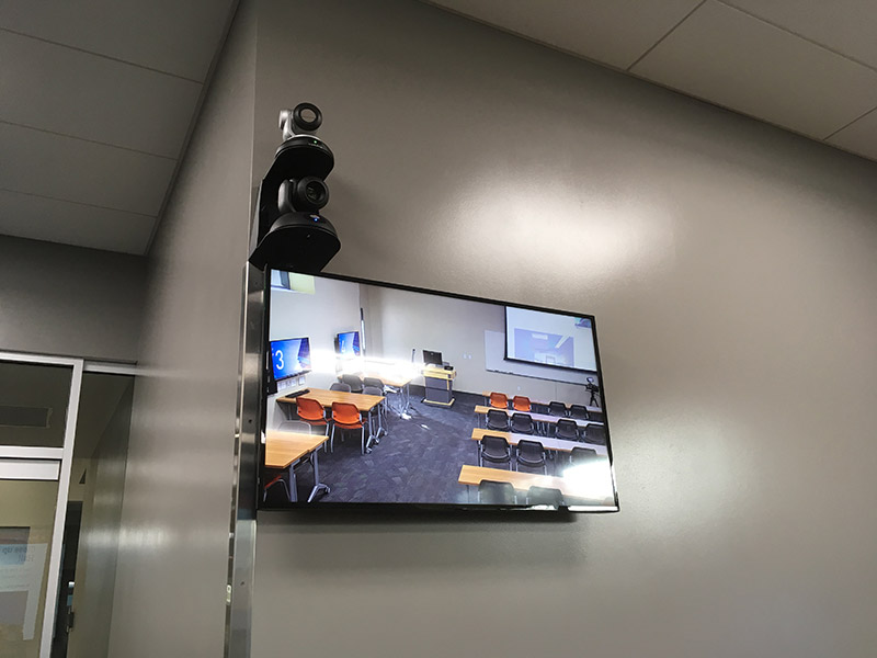 RoboTRAK system above a display.