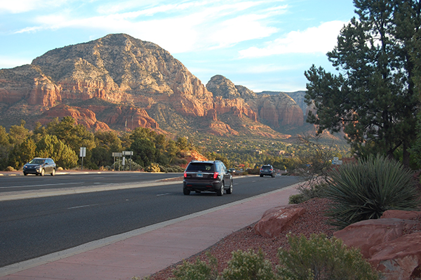 View in Sedona Arizona from street with mountains in background.