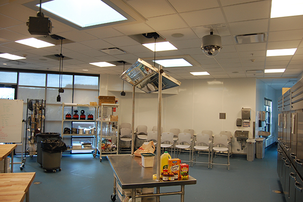 Vaddio camera above kitchen equipment.