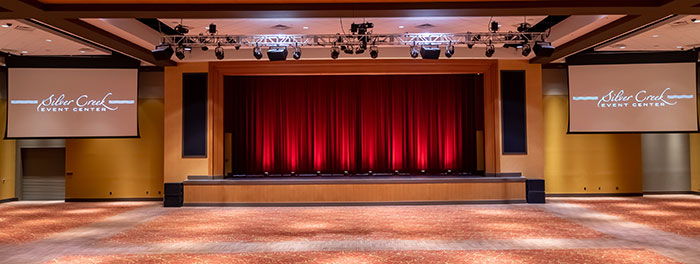 Customized Tensioned Professional screens flank the Silver Creek Event Center stage. 