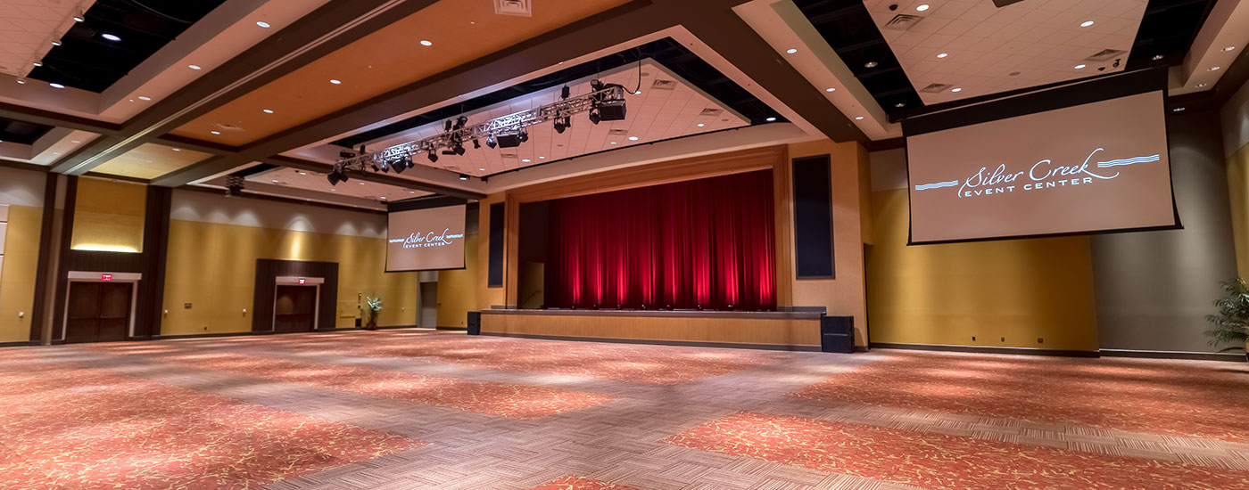 Customized Tensioned Professional screens flank the Silver Creek Event Center stage.