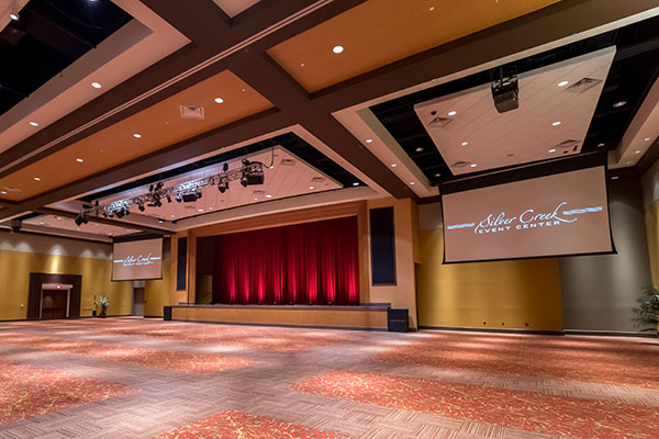 Customized Tensioned Professional screens flank the Silver Creek Event Center stage.