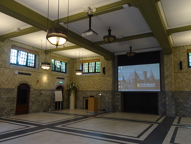 Open area with a FullVision screen on the wall