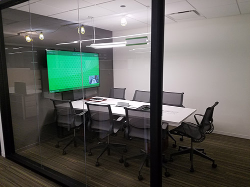 Conference room with Tempo holding display at one end