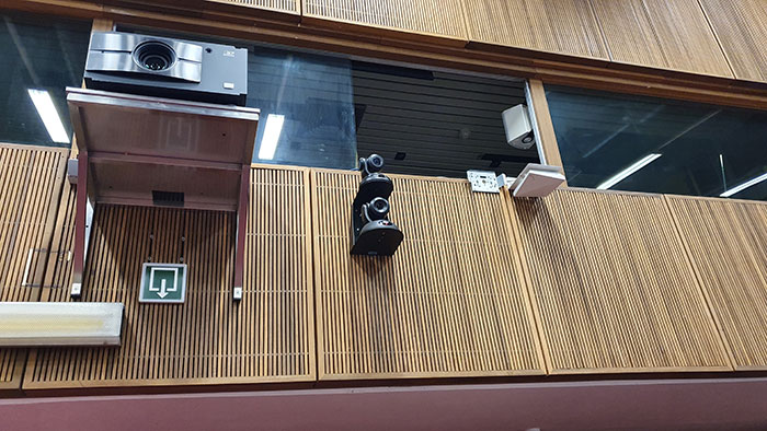 RoboTRAK presenter tracking system mounted to wall