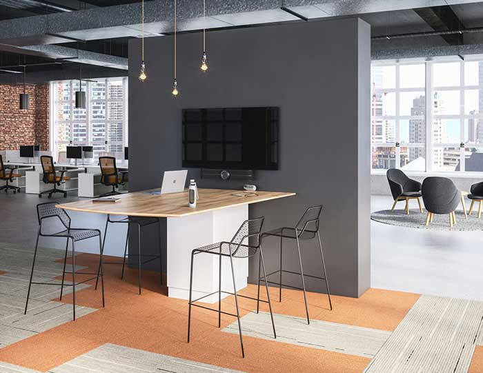 Office huddle space with a HuddleSHOT camera.