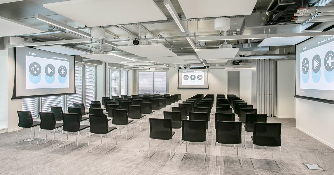 Projecta screens in a training room