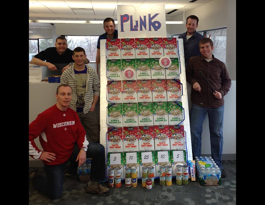 Milestone team makes a Plinko game out of donated food for charity