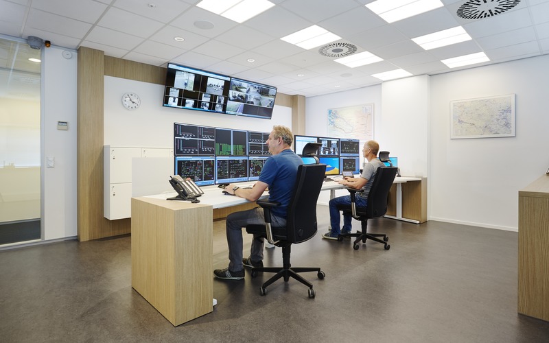 Hospital security control room with multiple monitors