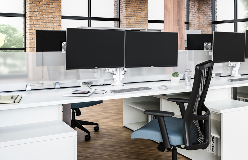 Chief monitor arms being used in an open workspace environment