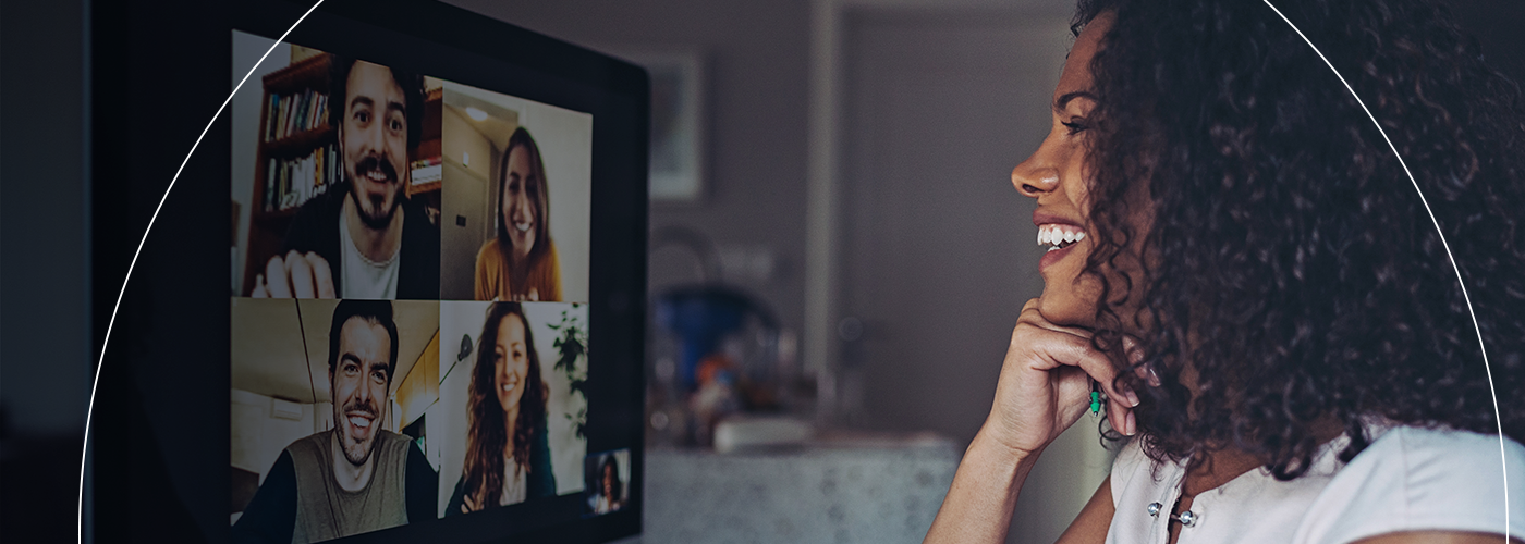 Work from home equipment allows a woman to join her colleagues from her portable workspace.